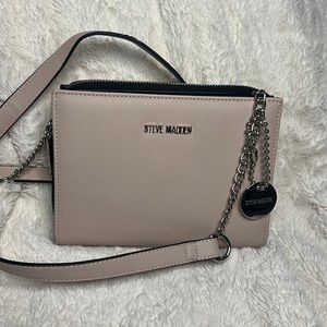 Steve Madden Crossbody purse. Blush pink with silver accent.